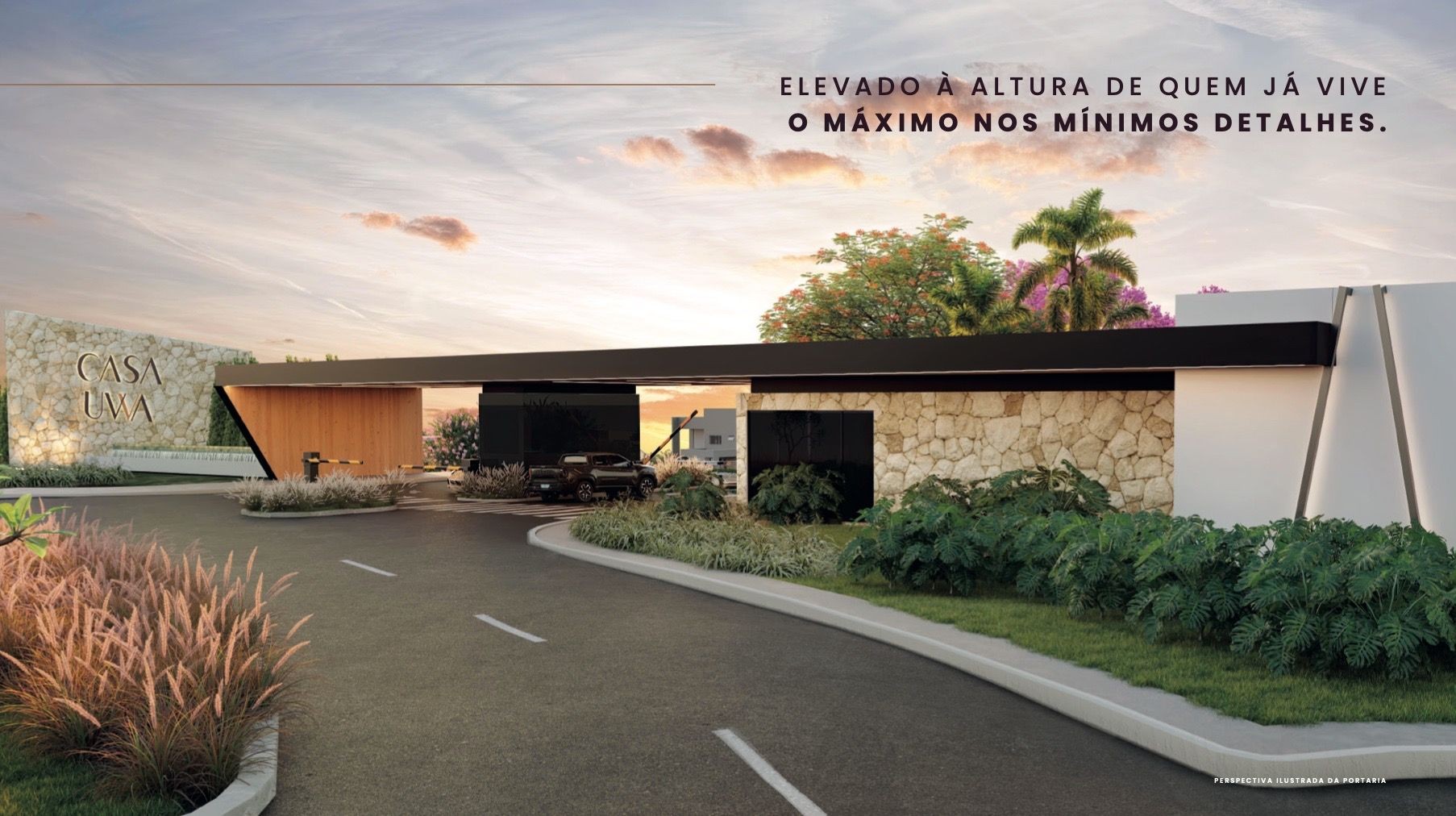 Modern entrance of a building labeled Casa UWA, with landscaping and a sunset view.