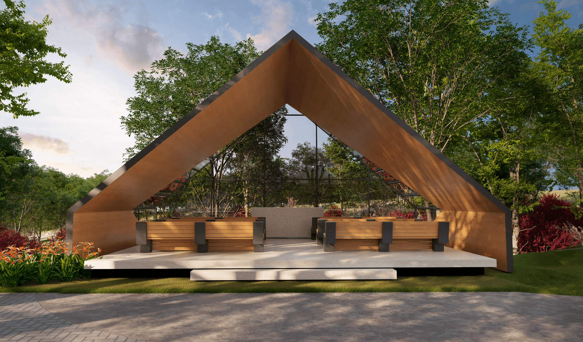 Modern outdoor pavilion with wooden benches and a triangular roof, surrounded by lush greenery and flowering plants.